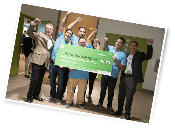 Method team celebrating after winning app development contest with their nonprofit CRM