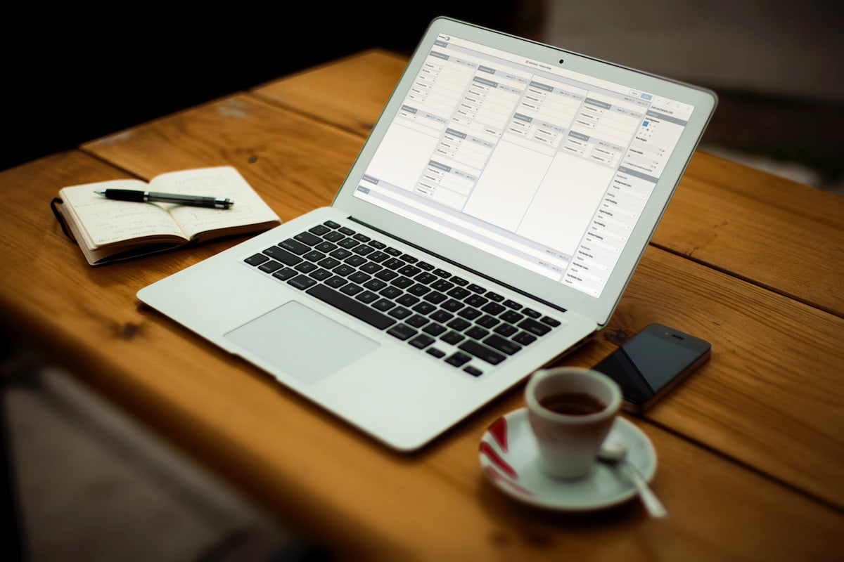 Laptop showing Method CRM sitting on a table