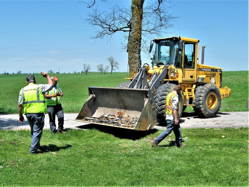 Work crew in action that can benefit from a time tracking tool