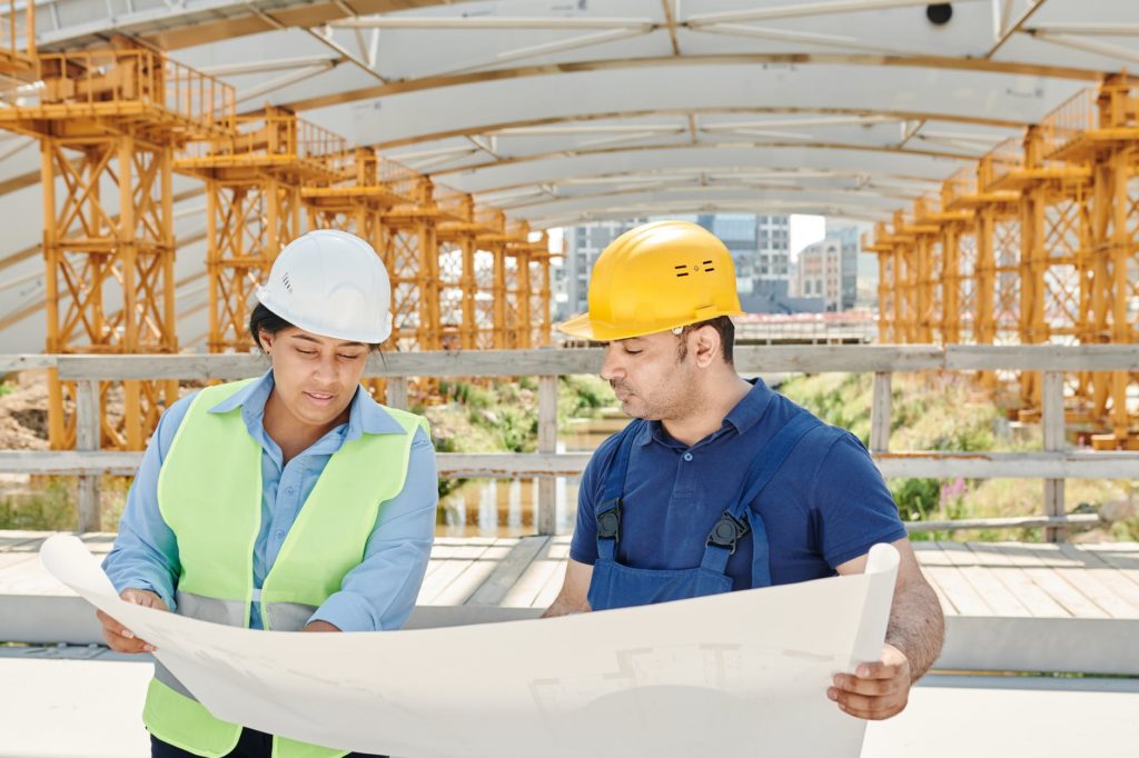 construction crew looking at plans