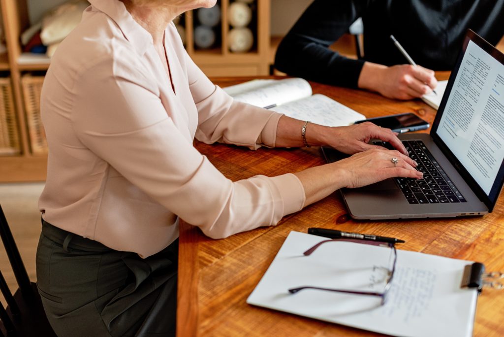Businesswoman in a meeting with a laptop