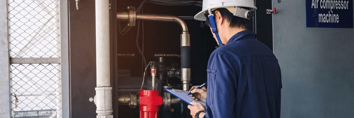 Technician is recording data Voltage or current in control panel of power plants