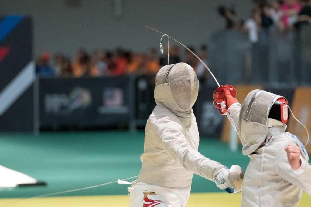 Two children fencing