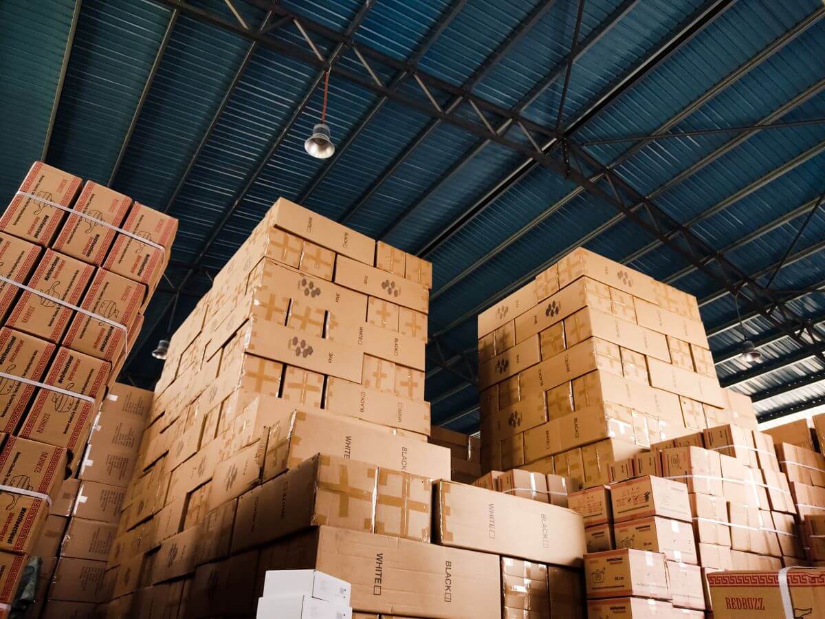 Boxes stacked in a warehouse.