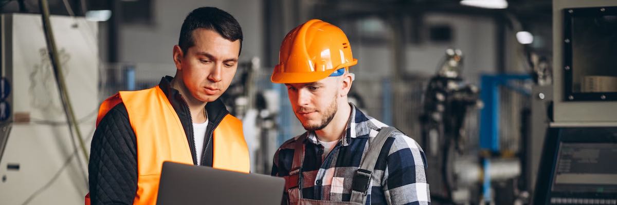 Two colleagues at a factory