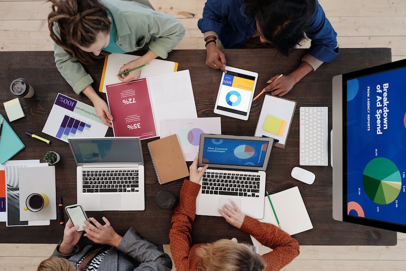 Business team working together on a desk