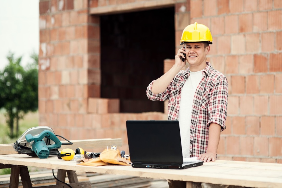 Carpenter talking on cellphone