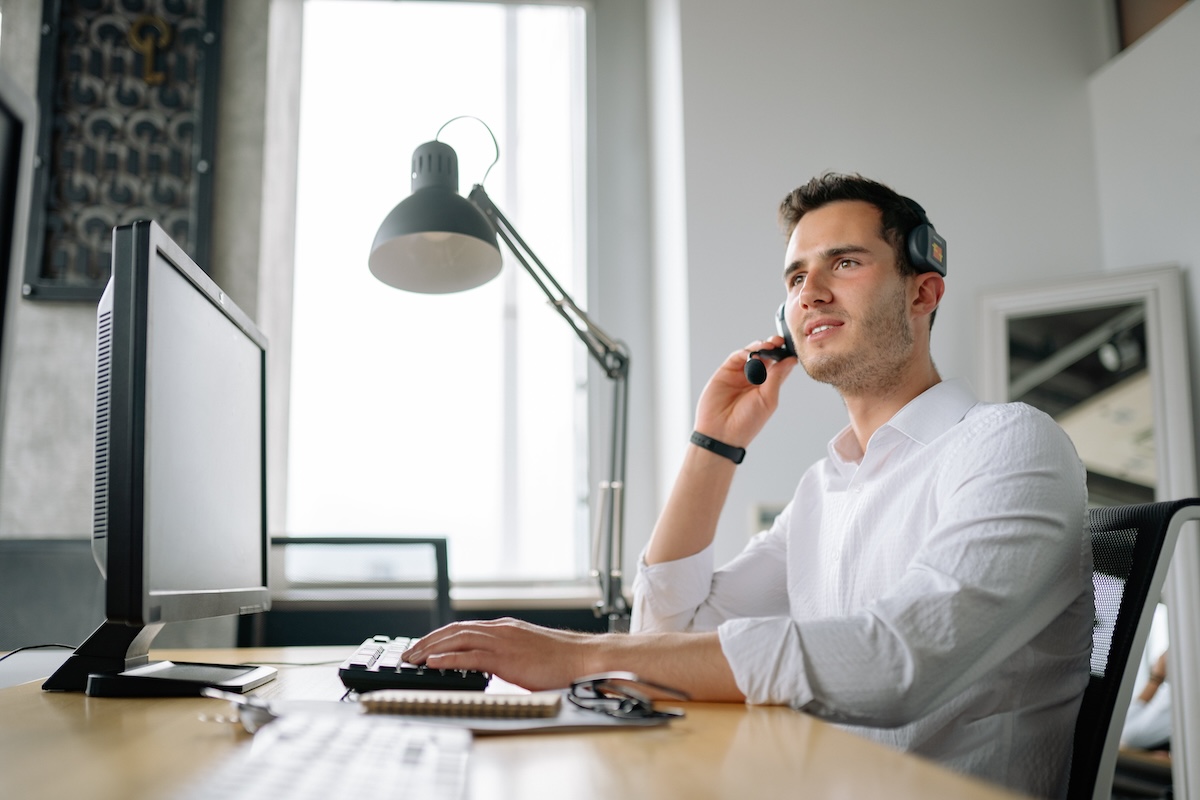 Businessman with headset in an office