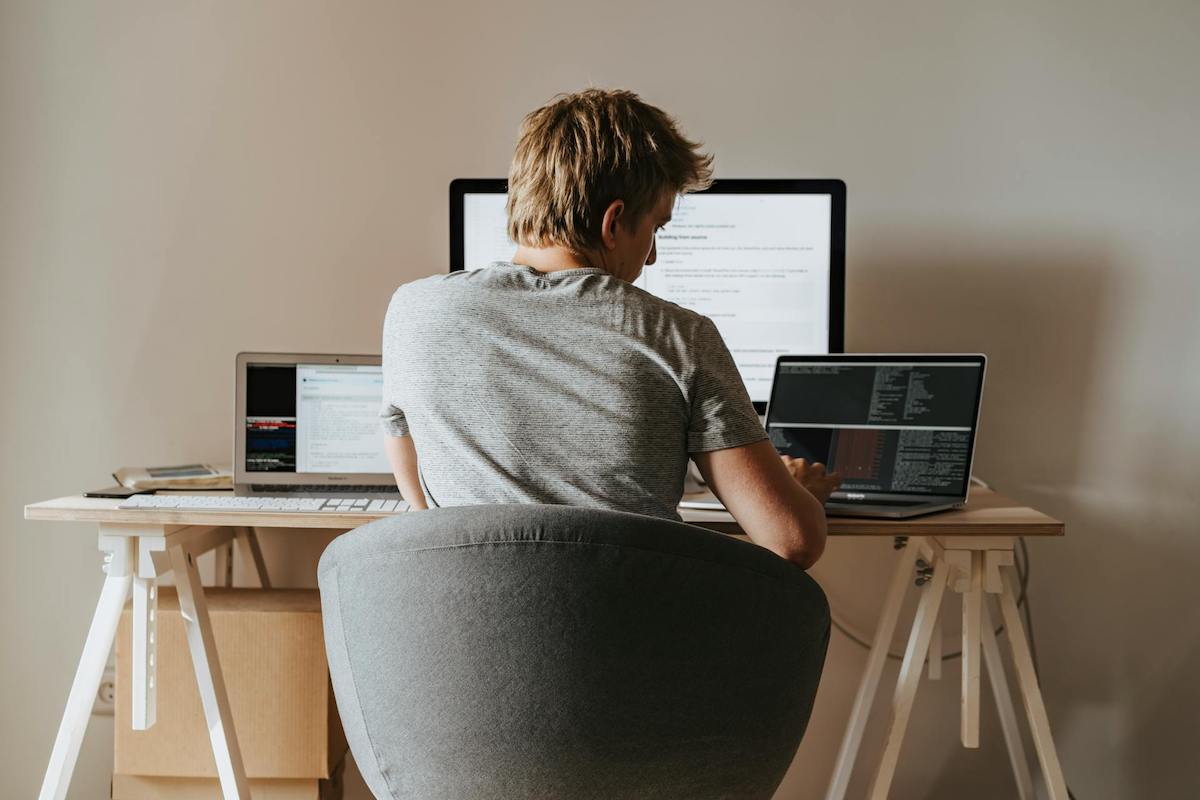 Photo of programmer working from home